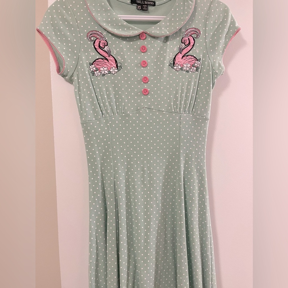 Iron fist mini dress, with embroidered flamingoes.